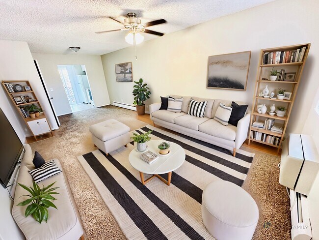 Embrace the warmth and elegance of this contemporary living room, perfect for relaxation and social gatherings. - Villa Rosa
