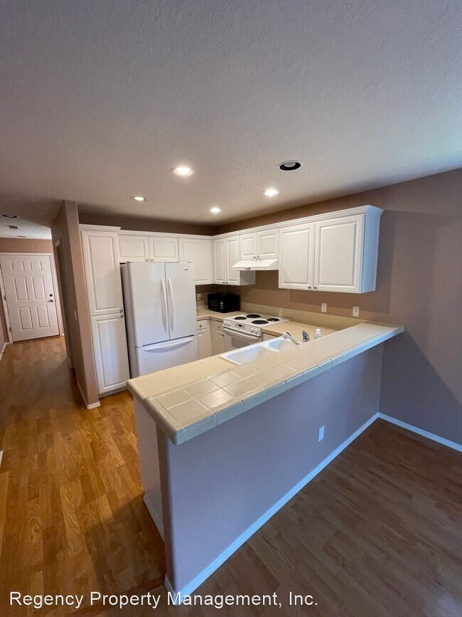 Building Photo - 3 br, 2.5 bath House - 6529 NW Connery Ter...