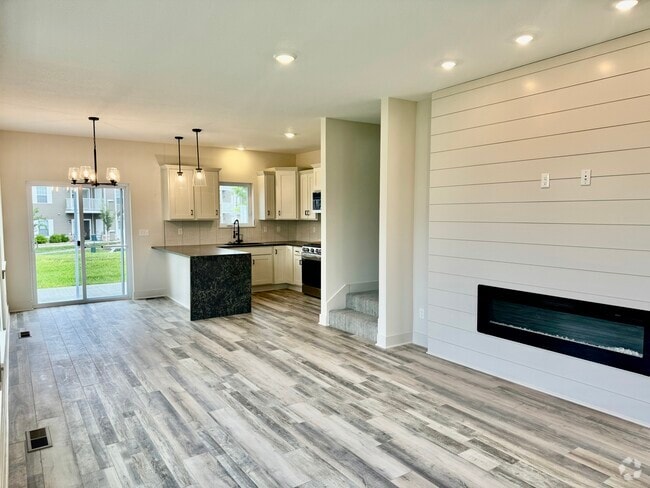 Living room looking towards kitchen - 22914 W 72nd Ter