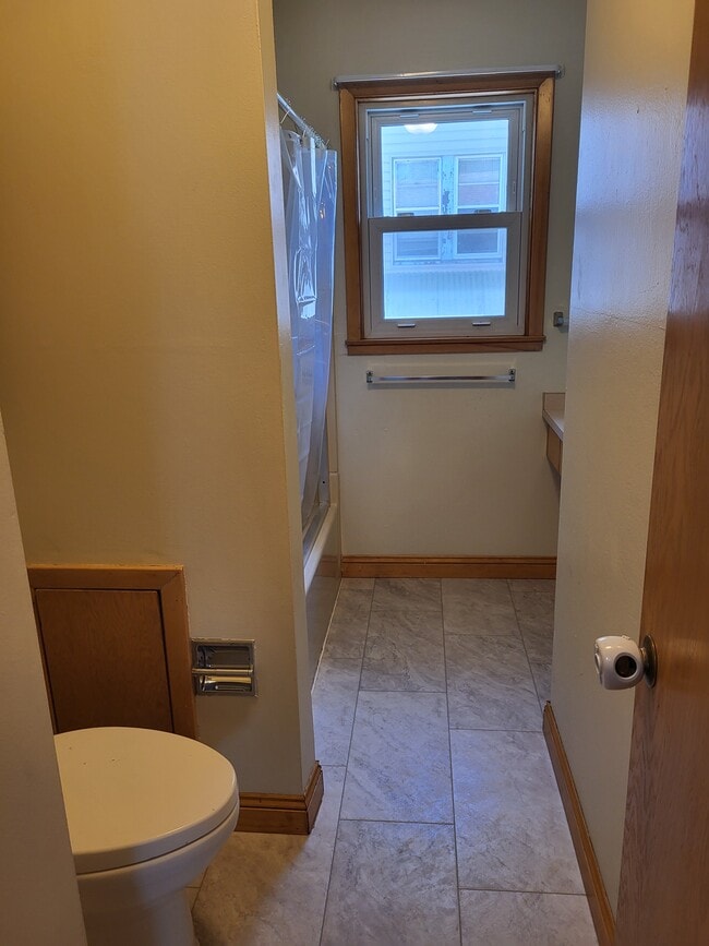 Bathroom with new flooring - 1411 S Duluth Ave