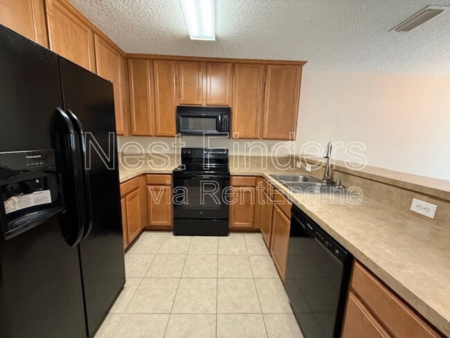 Building Photo - 808 Black Cherry Dr S