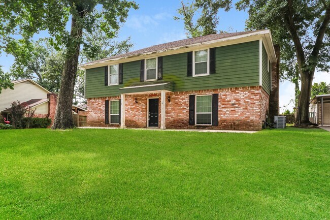Foto del edificio - 10122 Woodhollow Dr