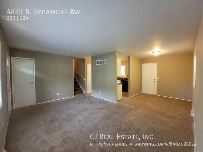 Building Photo - 4833 N Sycamore Dr
