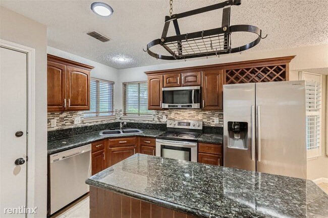 Building Photo - 5 br, 2.5 bath House - 8802 Boise Hills Dr...