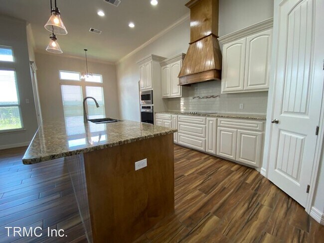 Foto del edificio - 5 br, 3 bath House - 7826 STAMPEDE DR