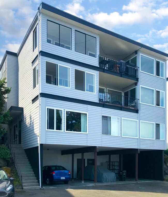 One Dedicated parking space + an additional available for purchase - 3620 26th Pl W