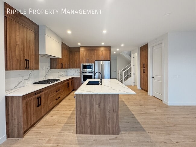 Building Photo - BRAND NEW 4 BEDS, 3.5 BATHS TOWNHOUSE | COMMUNITY OF COUGAR RIDGE