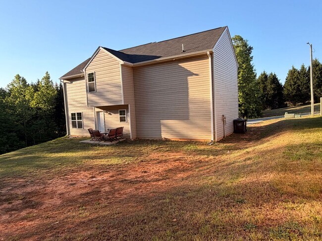 Building Photo - Available Now – Spacious 4BR Home on 1.5 Acres in Rural Hall!