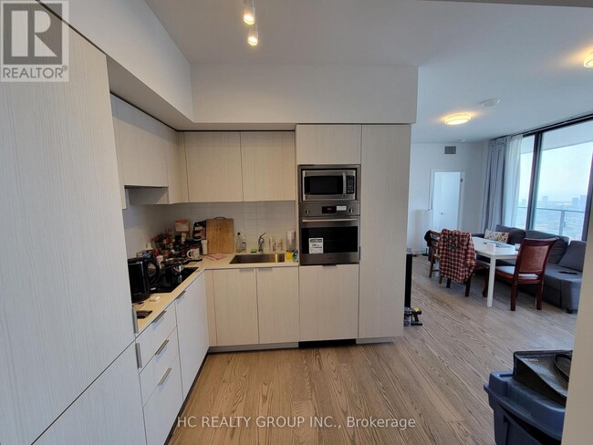 Building Photo - 11 Wellesley St W