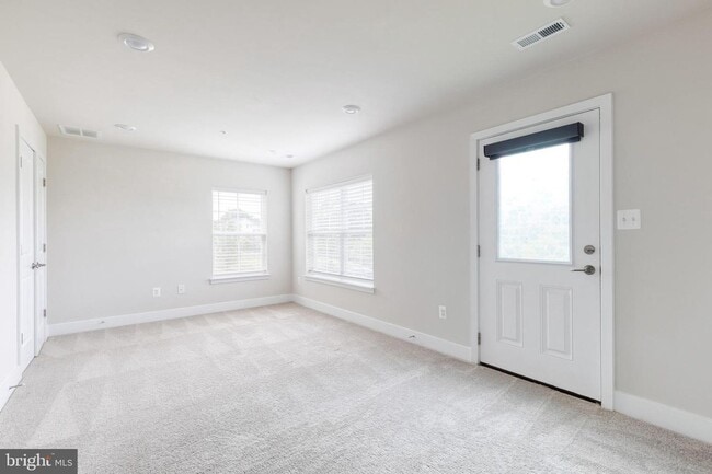 Building Photo - Live in Luxury in This Nearly New End-Unit...