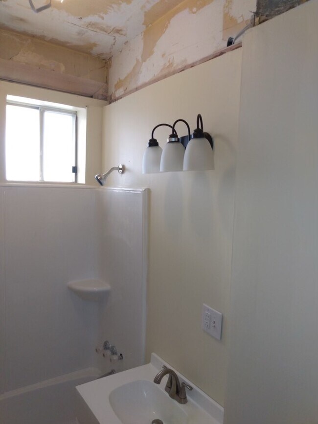 bathroom and fixtures - 3437 McClure Ave