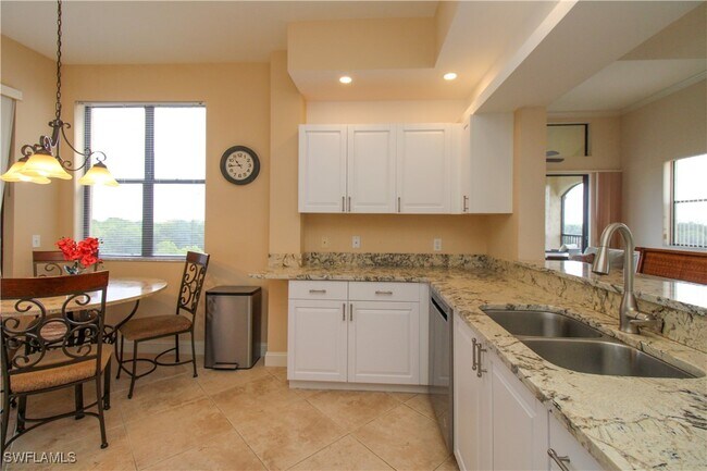 Building Photo - 7024 Pelican Bay Blvd