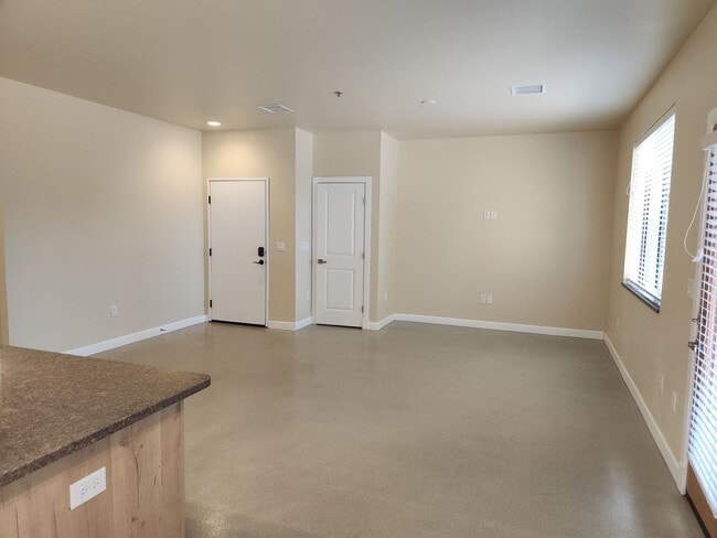 Building Photo - NEW Bison Cove E4 End Unit Now Available