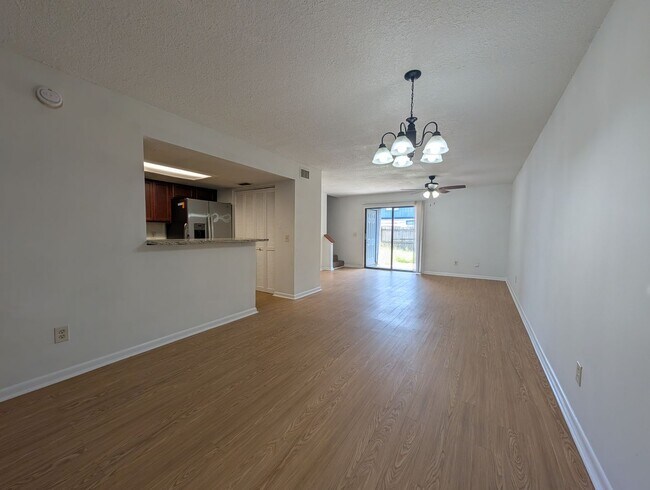Building Photo - NOW AVAILABLE! Upgraded 3 Bedroom, 2 Bath Townhome with a Fenced yard, and close to NAS Jax and I...