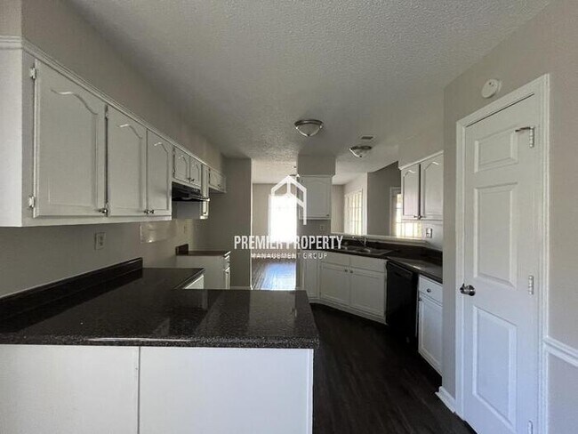 Building Photo - 8398 Wind River Cir N