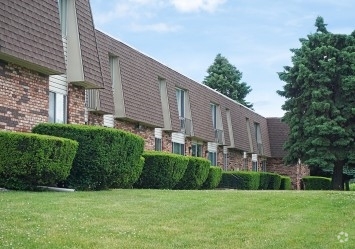 Building Photo - Holiday Garden Apartments