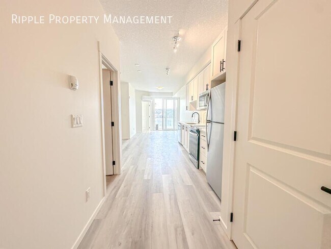 Photo du bâtiment - FANTASTIC 2 BEDS/ 1 BATH CONDO
