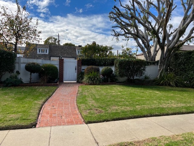 Front of property outside gate - 2555 Colby Ave