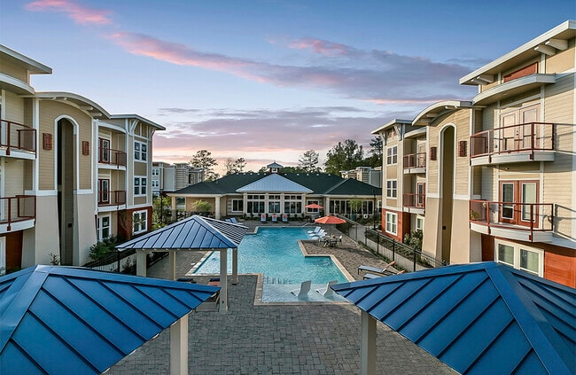 Resort-Style Pool with Cabanas - Artesia Apartments