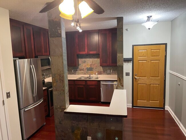 Unit front door and kitchen - 4824 E 53rd St