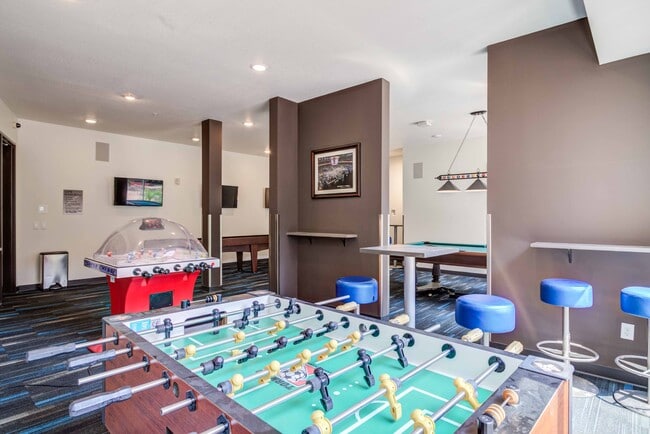 The-Knoll-Dinkytown-Off-Campus-Apartments-Near-The-University-of-Minnesota-Resident-Clubhouse-Game-Room-Foosball - The Knoll Dinkytown