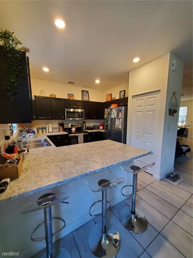Foto del edificio - 3 br, 2.5 bath House - 18421 NW 89th Ct