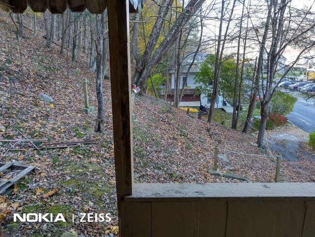 Building Photo - Cozy 2 bed 1 bath deck house with enclosed...
