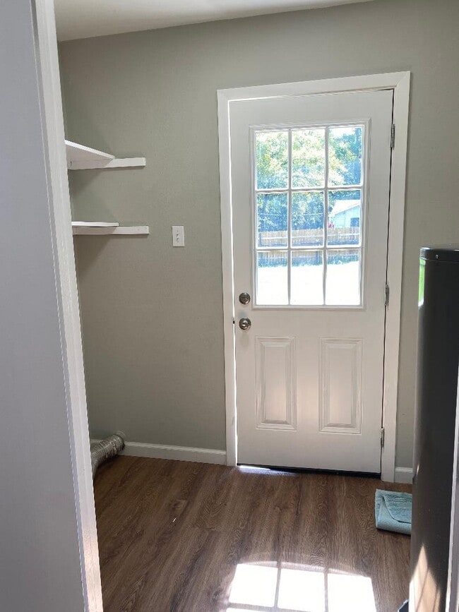Laundry room with hookups and space for shelving - 16903 Boothill Rd
