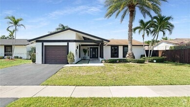 Building Photo - 16887 Royal Poinciana Dr