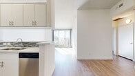 Located on Oxnard Street in North Hollywood, Los Angeles, this one-bedroom, one-bathroom unit offers a well-designed layout across a single floor. The open-concept living area flows seamlessly from the kitchen, creating a connected and functional living space. Light wood-style flooring runs throughout, complementing the clean white walls and textured ceilings.

The kitchen features white cabinetry with brushed nickel hardware, a mosaic tile backsplash, stainless steel appliances including a gas range and refrigerator, and a peninsula counter that opens to the living area. The living room is bright and airy, with a large sliding glass door that leads to a private balcony offering views of palm trees and the surrounding hills.

The bedroom is a well-proportioned retreat with wood-style flooring, a textured ceiling, and a mirrored sliding closet that enhances the sense of space. Natural light filters in through a window dressed with curtains.

The bathroom is finished with a white vanity, brushed nickel fixtures, and a full-size soaking tub framed by floor-to-ceiling linear stone-patterned tile. Wood-look flooring ties the space together with the rest of the unit. Overall, the space presents a clean, modern aesthetic with ample natural light throughout.