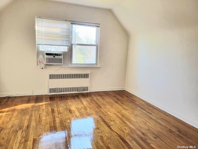 Building Photo - 203-16-203-42 42nd Ave