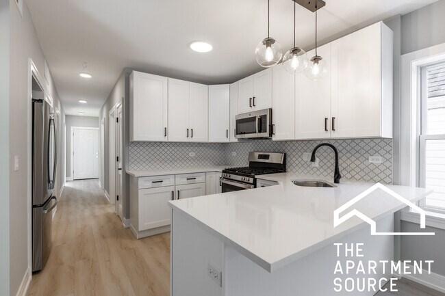 Foto del edificio - 3443 N Ridgeway Ave