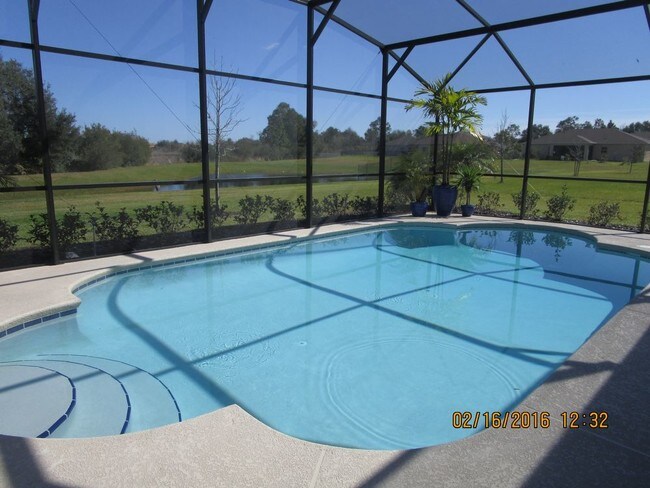 Building Photo - 4/2 Pool Home Ready NOW in Bella Pointe