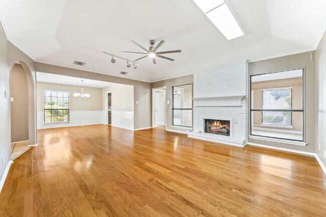 Building Photo - "Charming garden home offers 3-Bedroom Sanctuary with Cozy Fireplace in San Antonio – 1710 Sq Ft ...