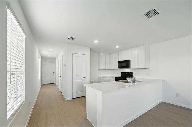 Foto del edificio - 907 Sandhill Crane Ln