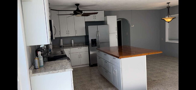 Building Photo - Charming 2-Bed Waterfront Retreat with Ter...