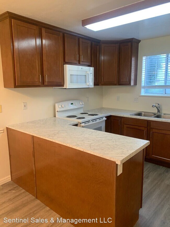 Building Photo - 2 br, 1 bath House - 1050 S. Orem Blvd. #35