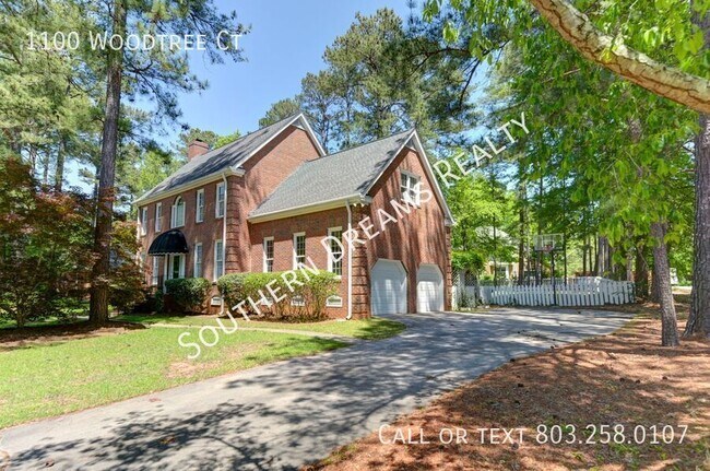 Building Photo - 1100 Woodtree Ct