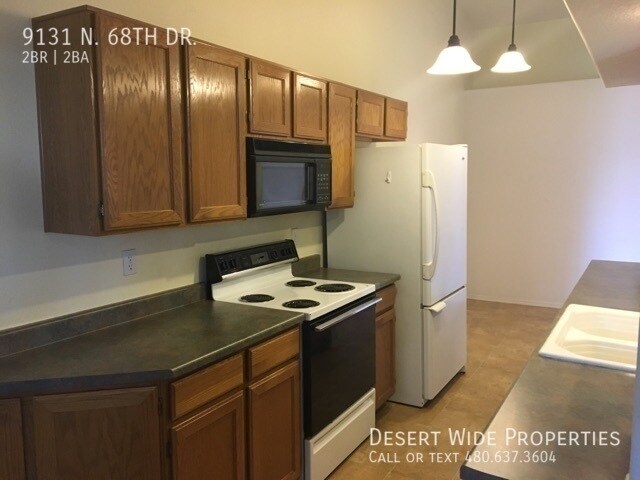 Building Photo - 9131 N 68th Dr