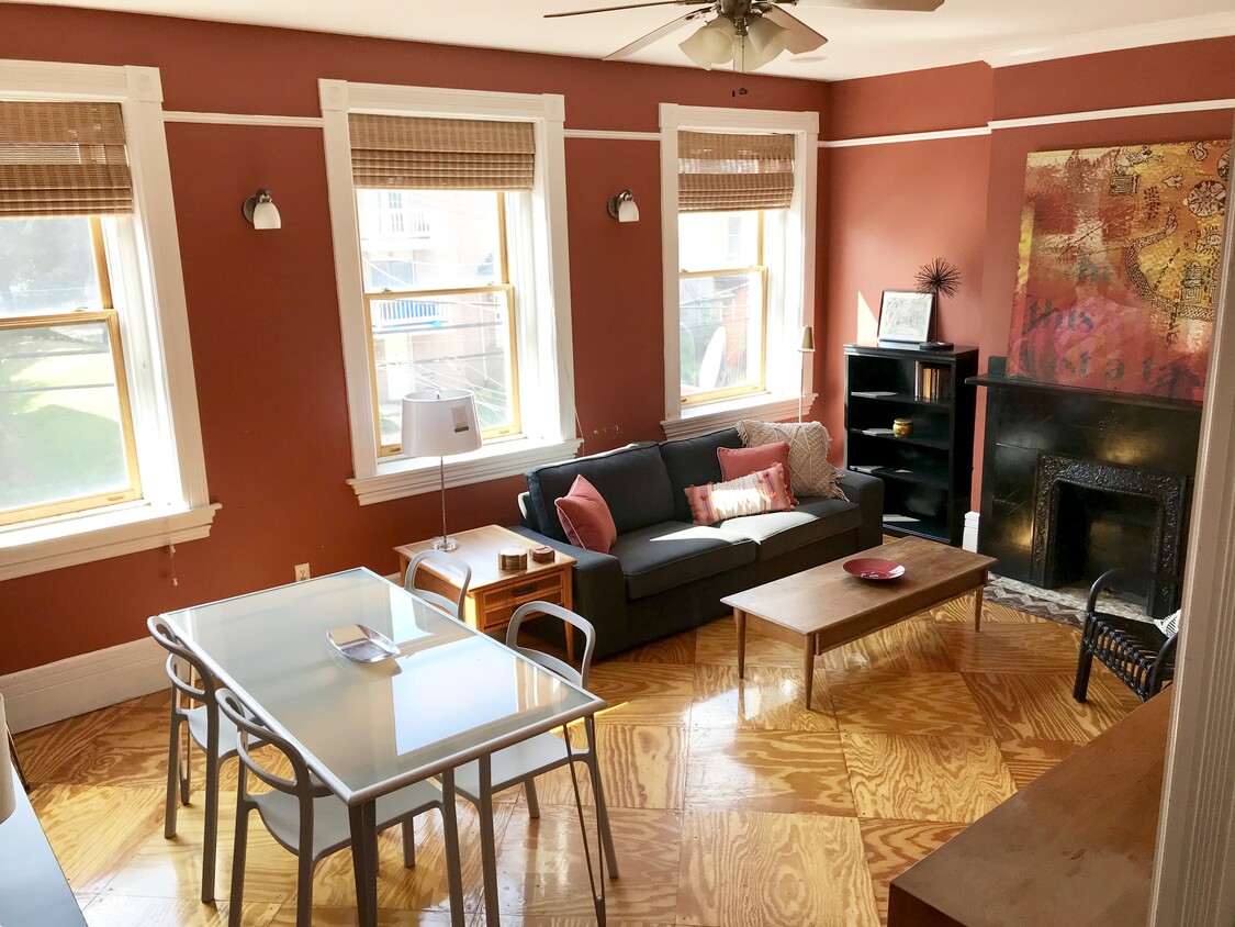 2nd floor living room (furnished). Dimensions (in U.S. feet): 13' x 16') Windows face west for afternoon light. - 3284 Dawson Street