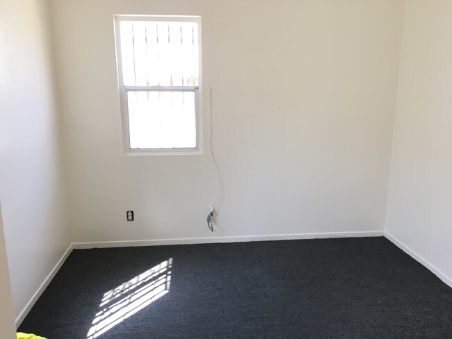 Building Photo - 1207 W 60th Pl