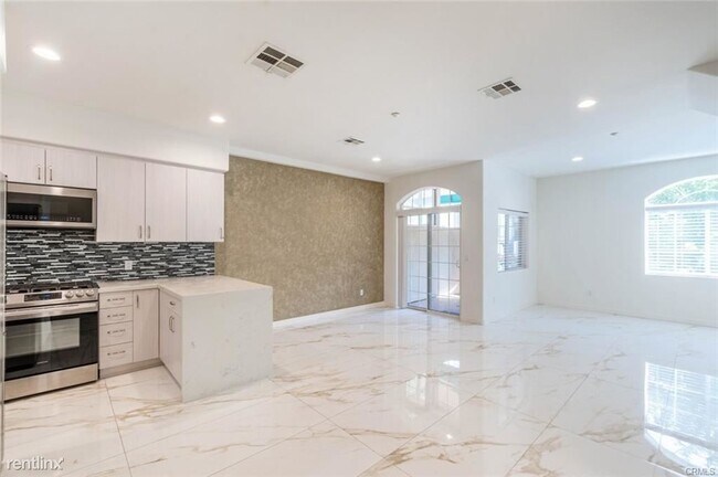 Foto del edificio - 2 br, 3 bath Condo - 1201 Viola Ave Apt 103