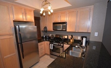 Building Photo - 447986678 Cerrillos Rd