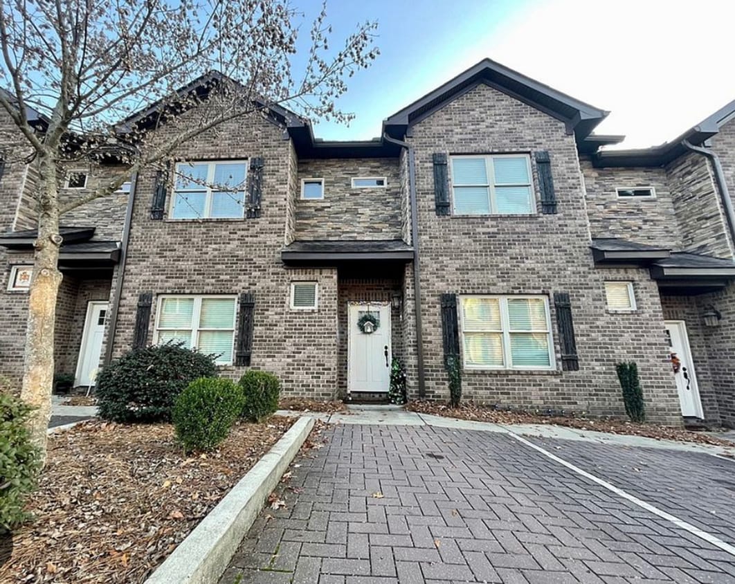 Building Photo - Heisman Villas: End Unit with Parking & Pr...