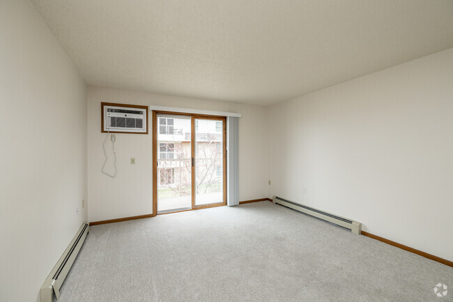 2BR, 1BA - 936SF - Living Room - Trollwood Village Apartments