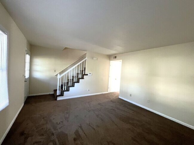 Building Photo - Two story duplex home! feels private like ...