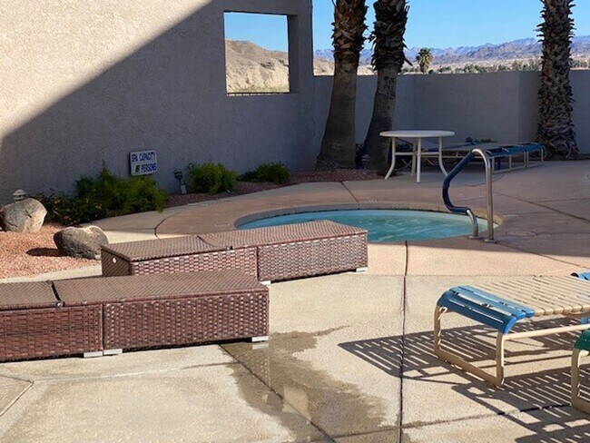 Building Photo - Waterfront 2BR 2B Condo Lower Level, gated with tennis,pool,spa,PRIVATE BEACH/DOCK