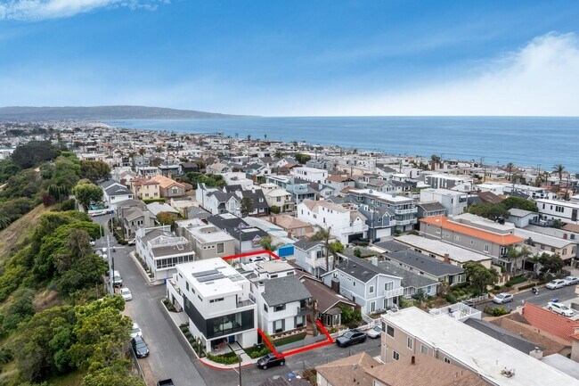 Building Photo - Modern Elegance Meets Ocean Breezes – Full...