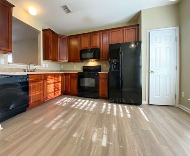 Building Photo - Spacious Ballantyne Living | 3BR, 3.5BA with Community Pool