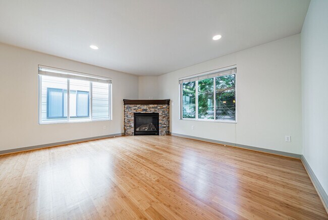 Gas fireplace in spacious living room - 12531 26th Ave NE